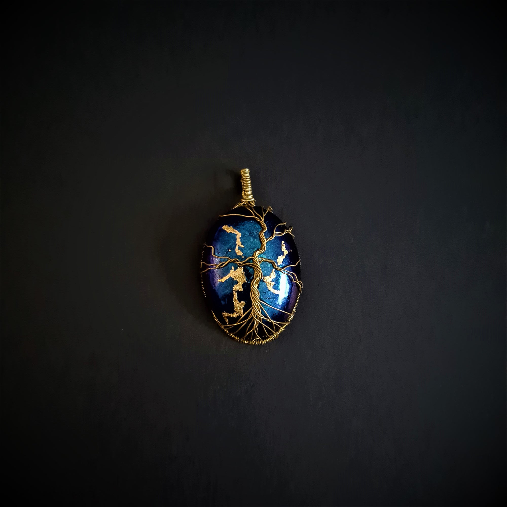 Tree of life with opal shaped blue iridescent pendant and necklace